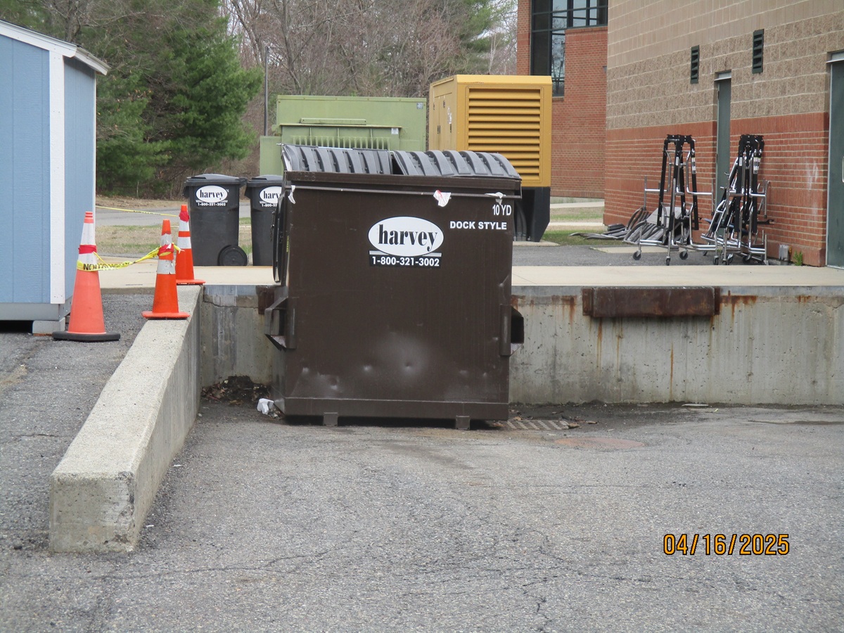 Maynard Schools unsecured trash dumpster